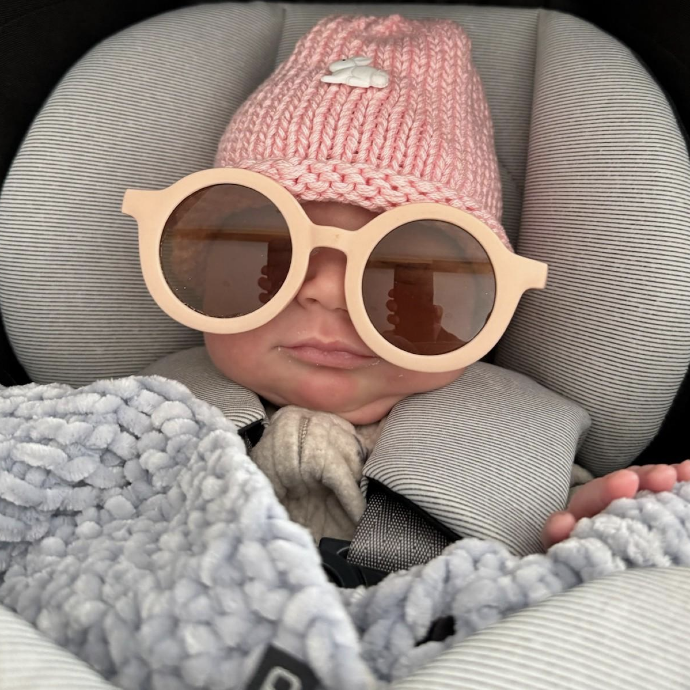 Baby Astrid in a bunny roll brim beanie