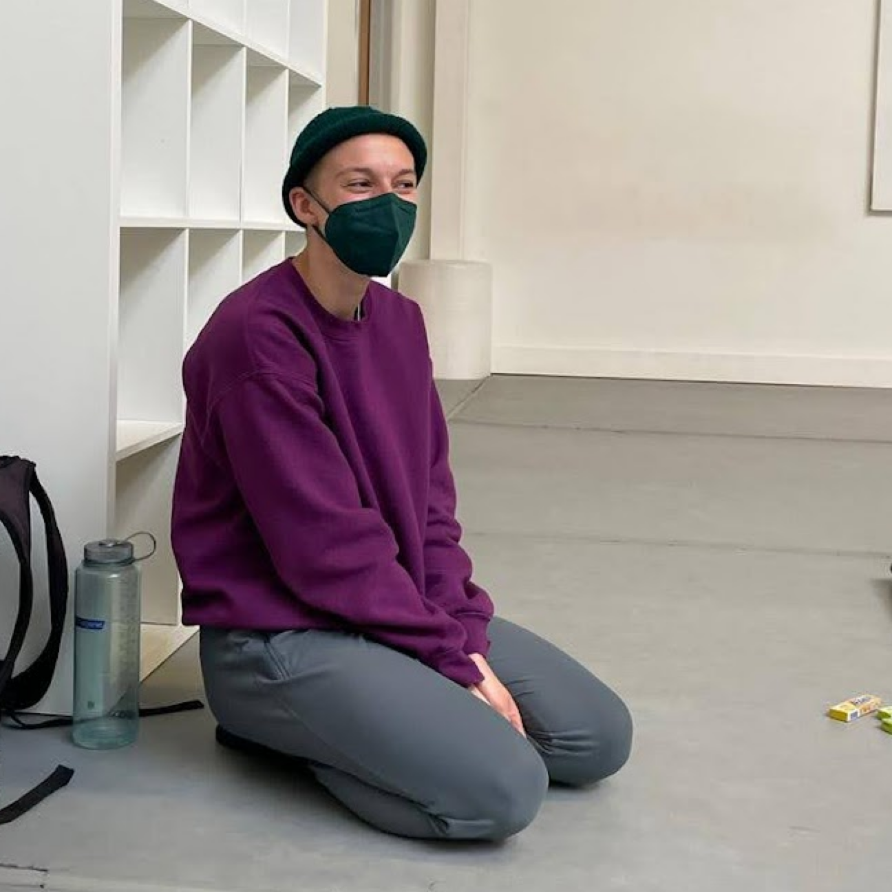 Emily in a roll brim beanie